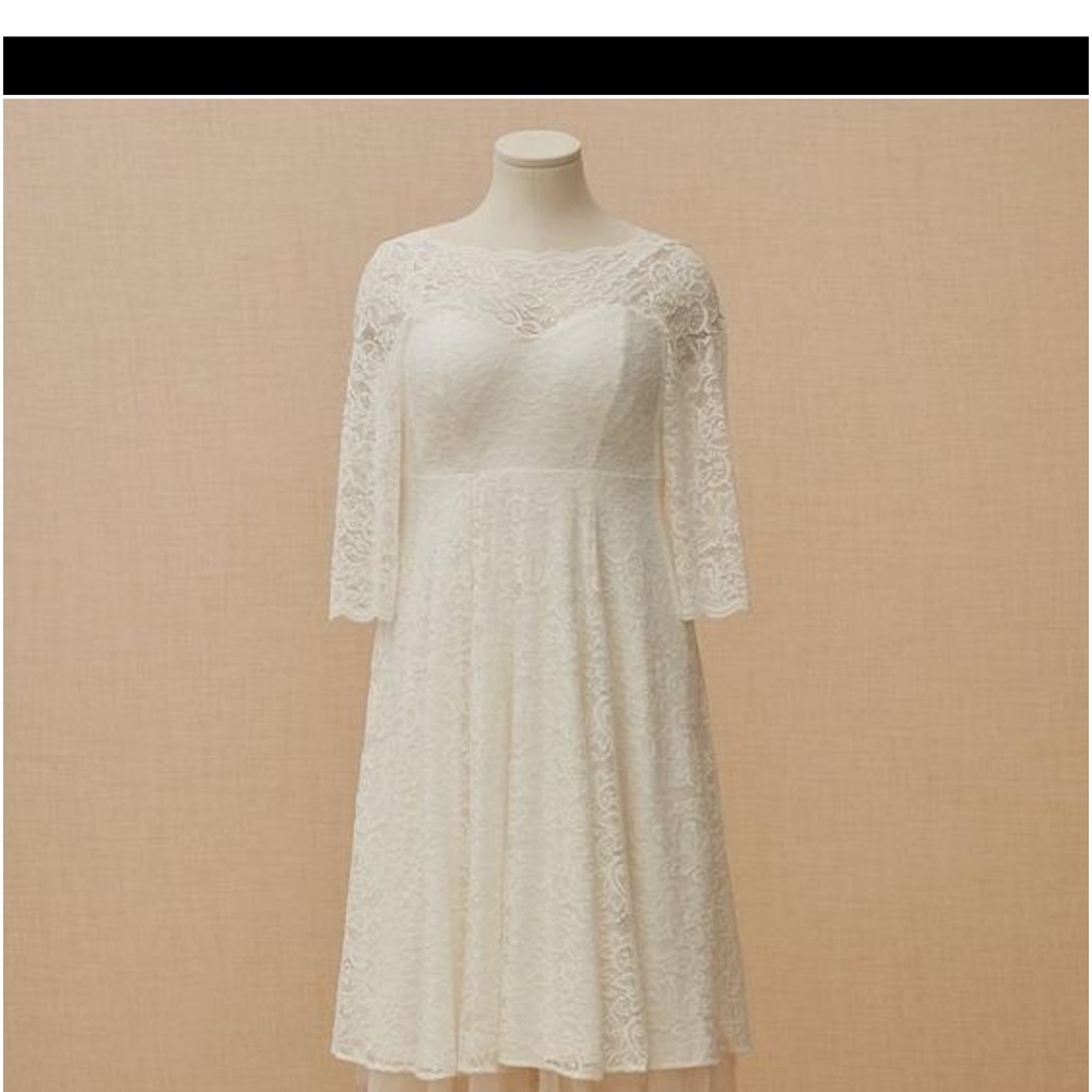 I am selling this beautiful white dress from Torrid.